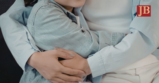 parent hugging a child